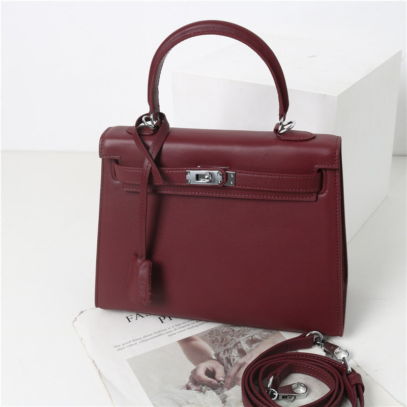 Womens Swift Leather Padlock Top Handle Cross Body Bag
