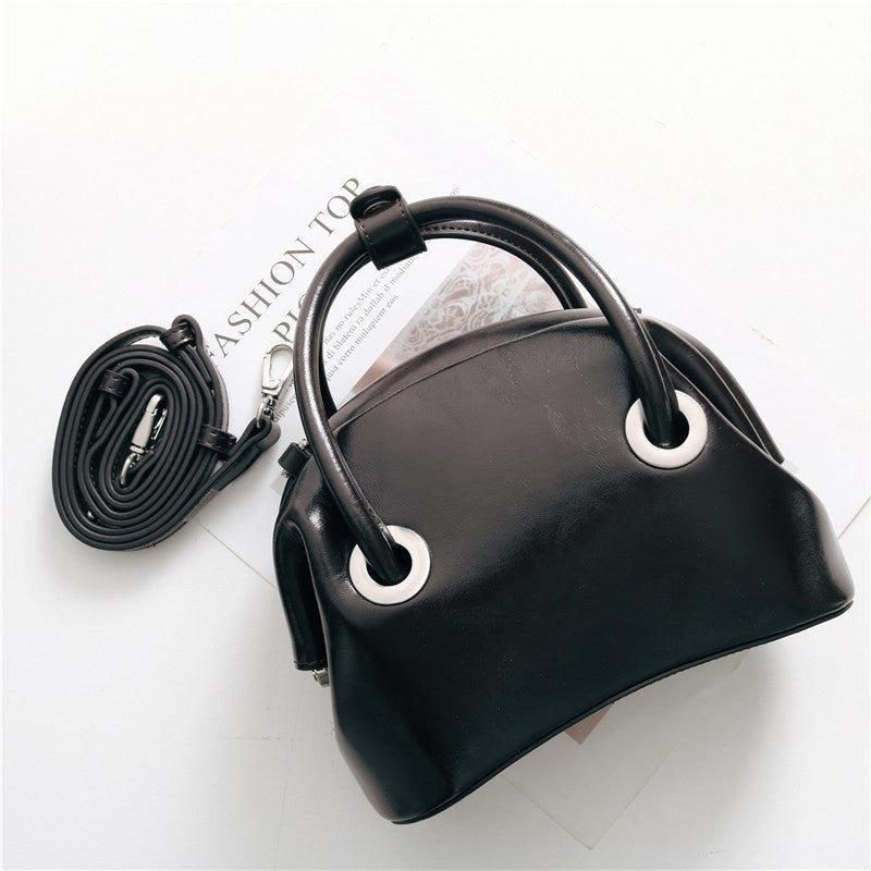 Mini Leather Circle Top Handle Bag