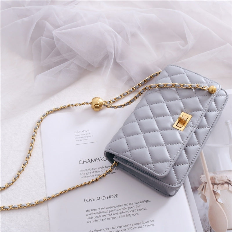 Women’s Mini Quilted Leather Shoulder Cross Body Clutch Bag With Ball Chain