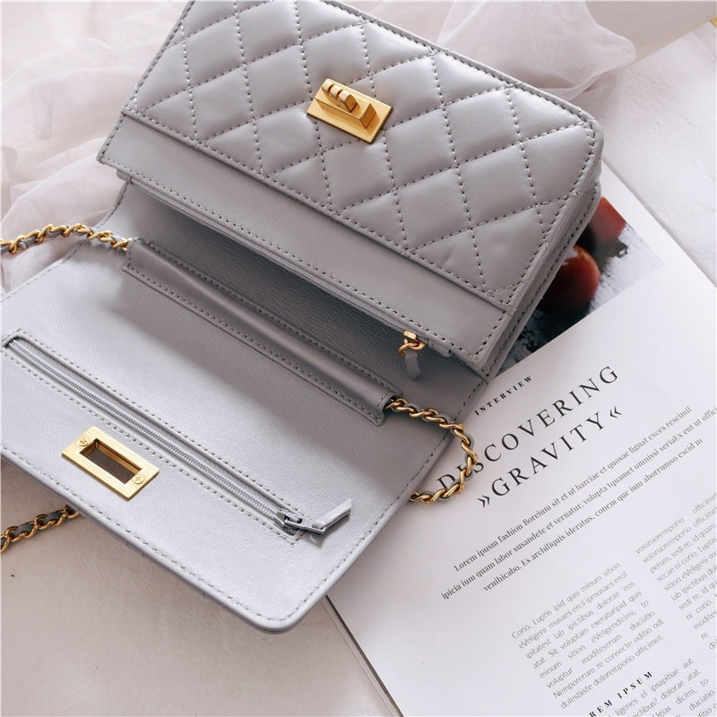 Women’s Mini Quilted Leather Shoulder Cross Body Clutch Bag With Ball Chain